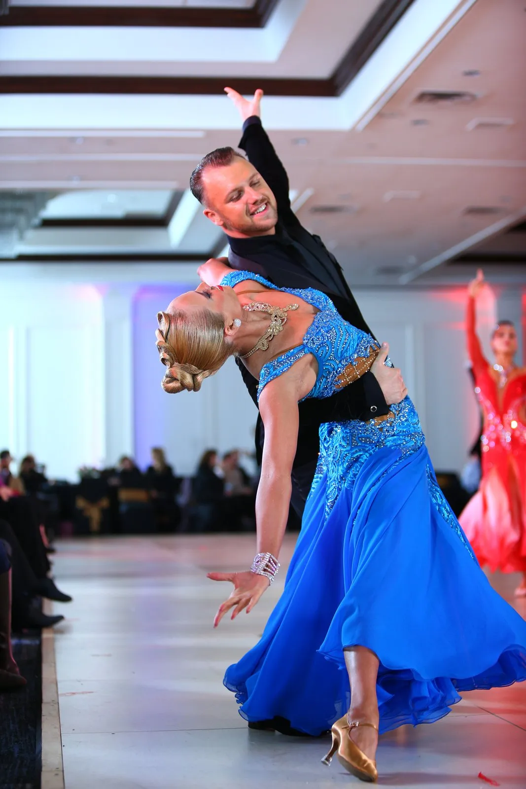Slawek and Denise in a ballroom line, Denise in a blue gown