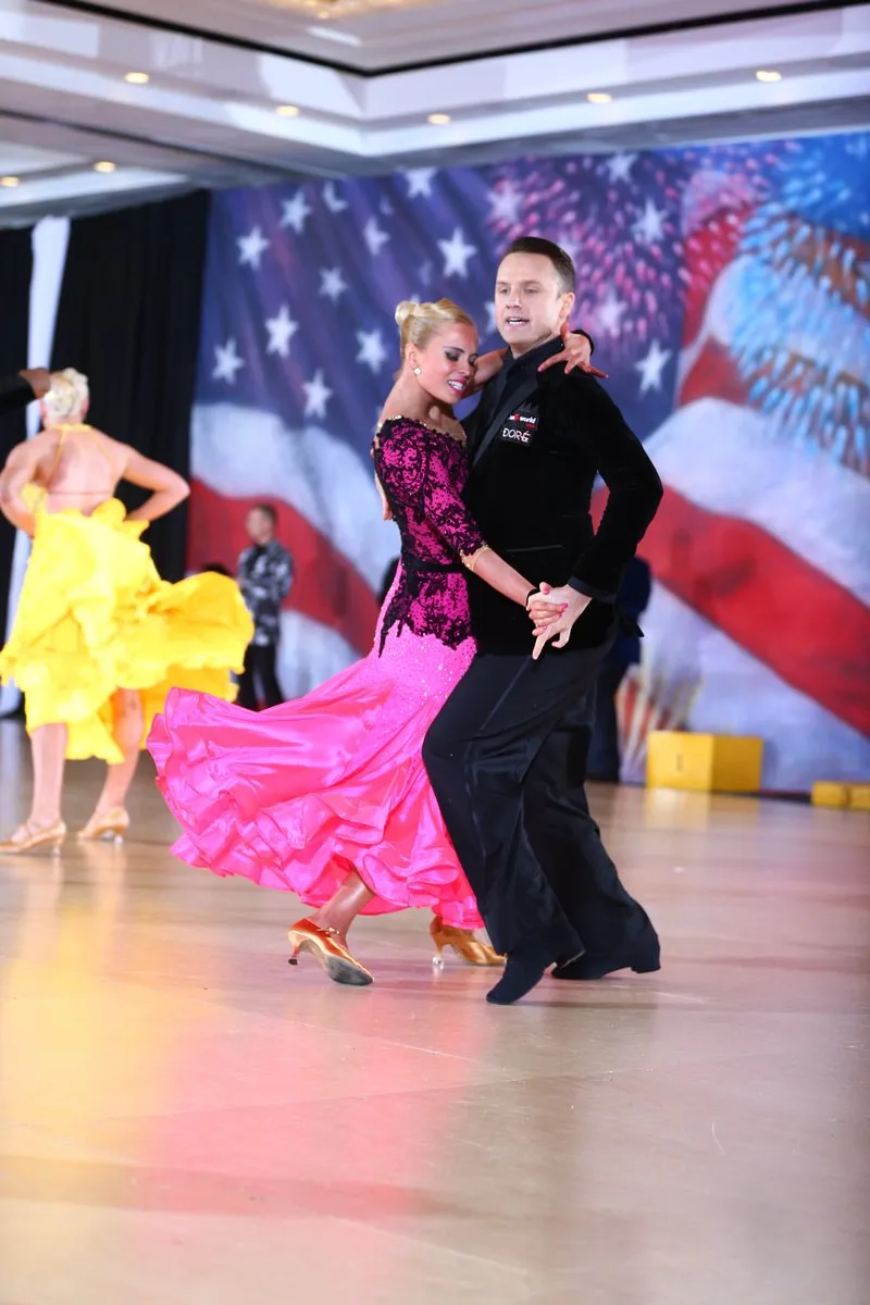 Slawek and Denise in promenade, Denise in a pink and black gown